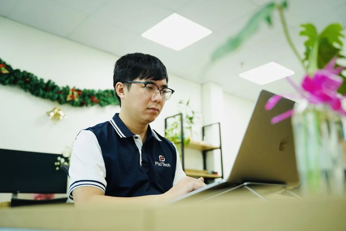 PixiTech engineer focused at work
