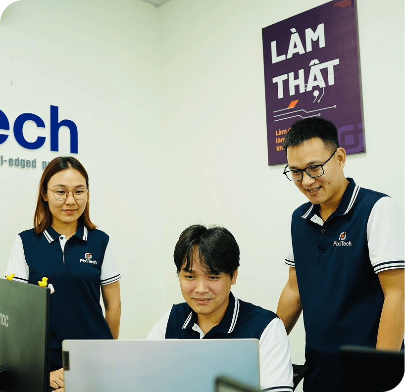 PixiTech engineers collaborating at a workstation